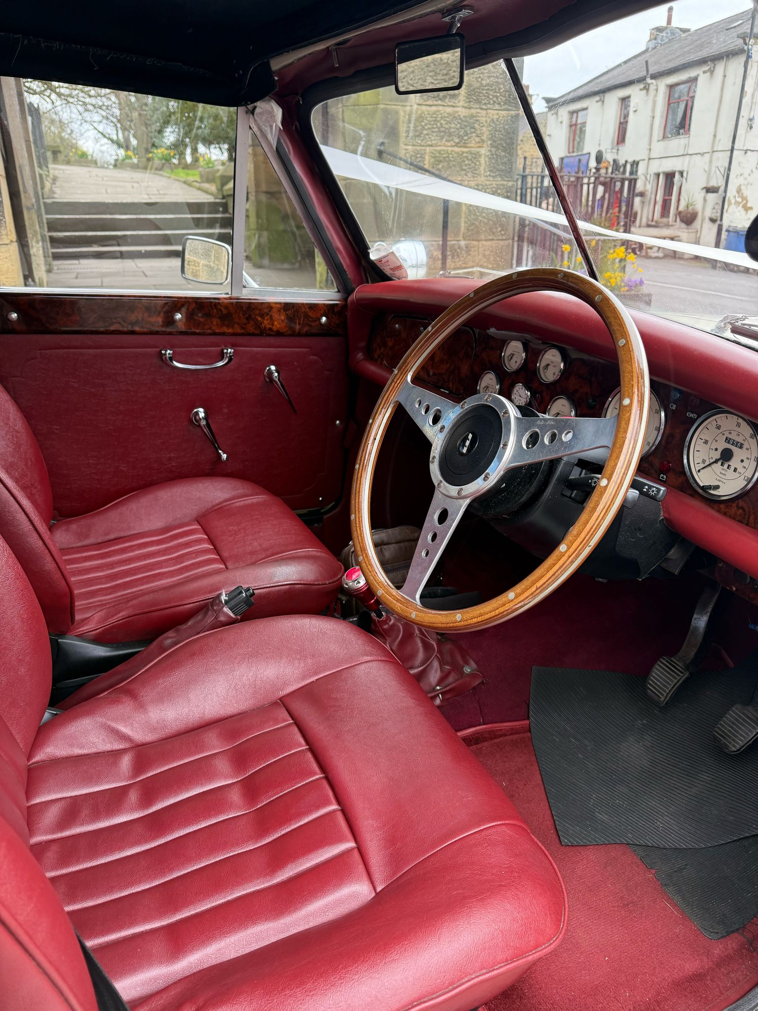 Burgundy interior and ivory bodywork